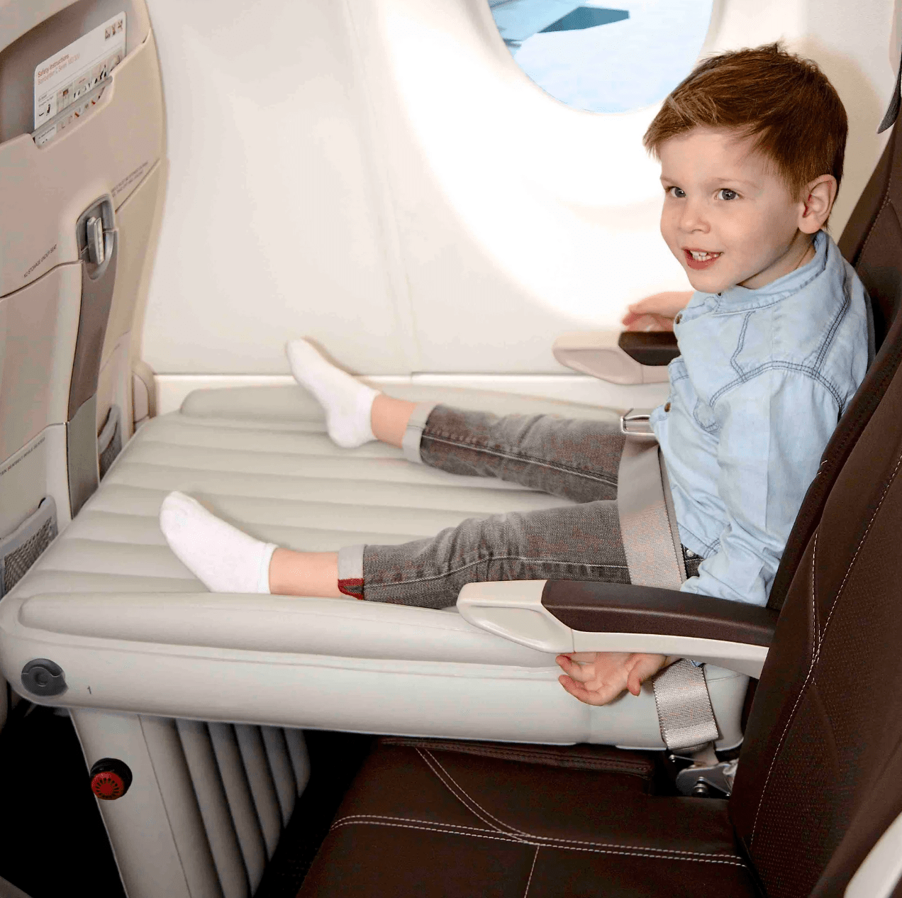 Inflatable bed for kids made of durable PVC, designed for easy setup and travel, perfect for airplane use. 0